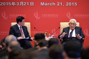 Kissinger addresses the Economic Development Forum in China last week